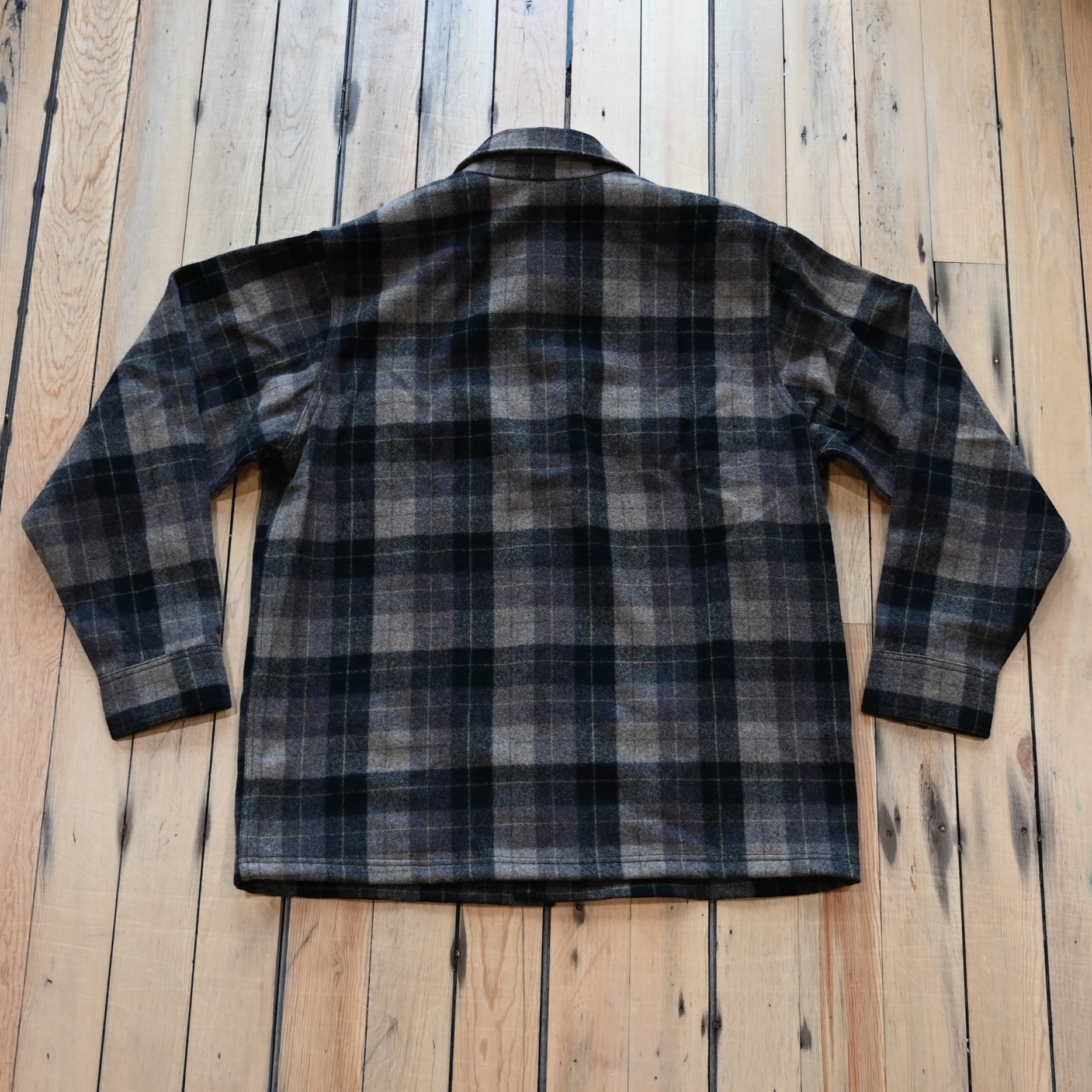 View of Filson Jac-Shirt featuring flap-covered chest pockets and straight hem