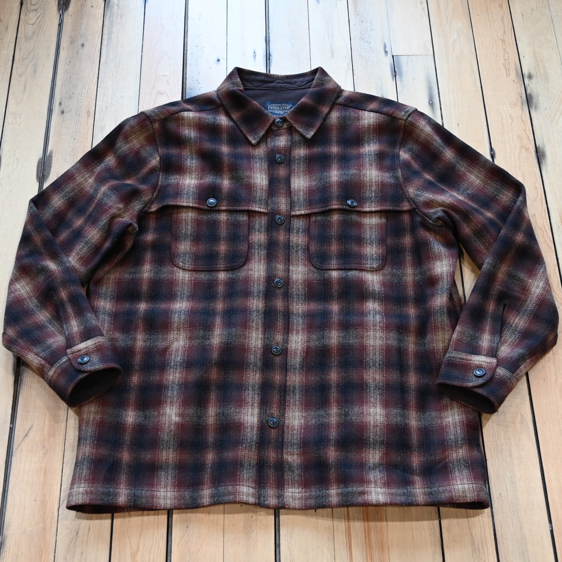 View of Pendleton men’s Heston wool coat in brown and rust ombré with chest and side pockets