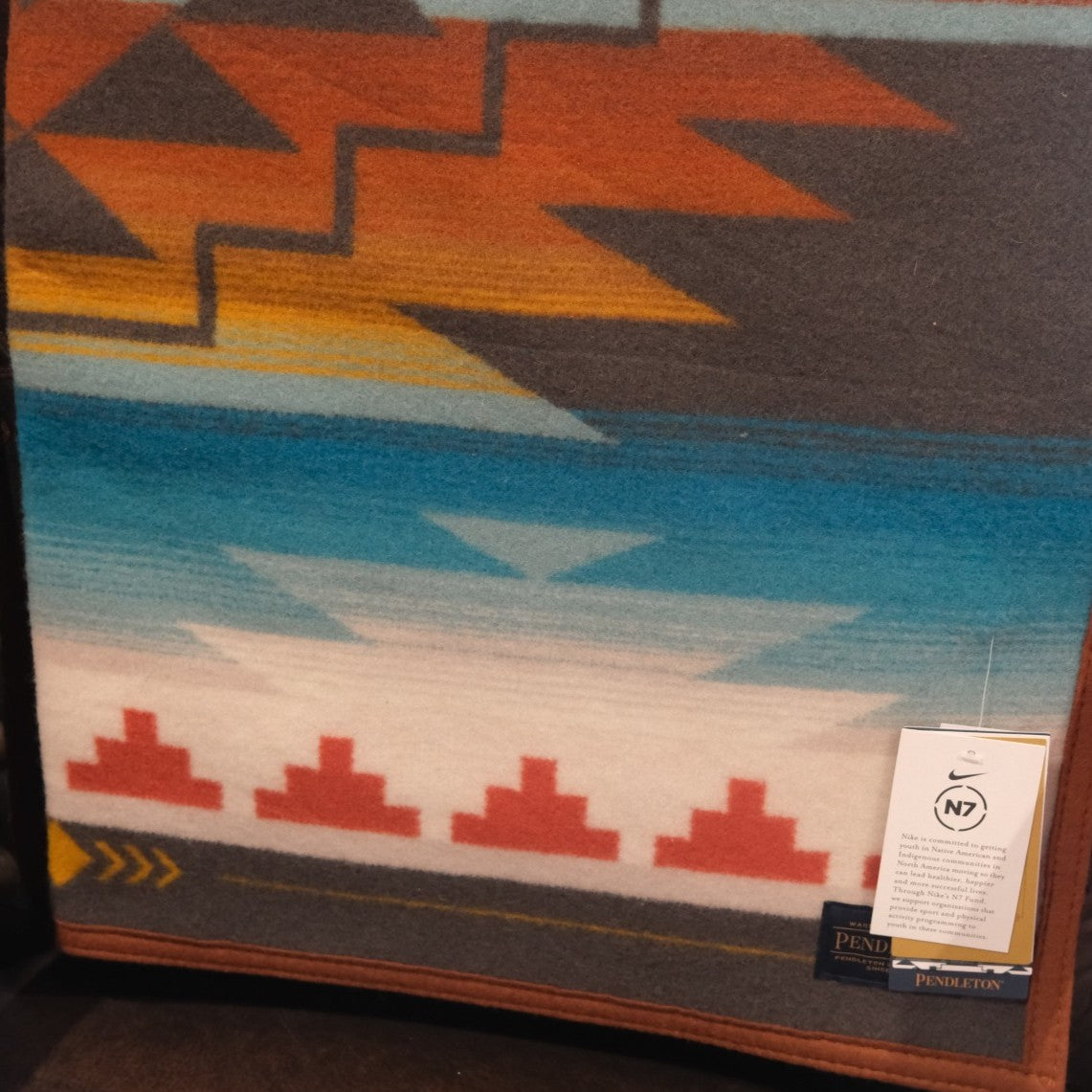 Nike N7 Seven Generations child-sized wool blanket in Turquoise by Pendleton.