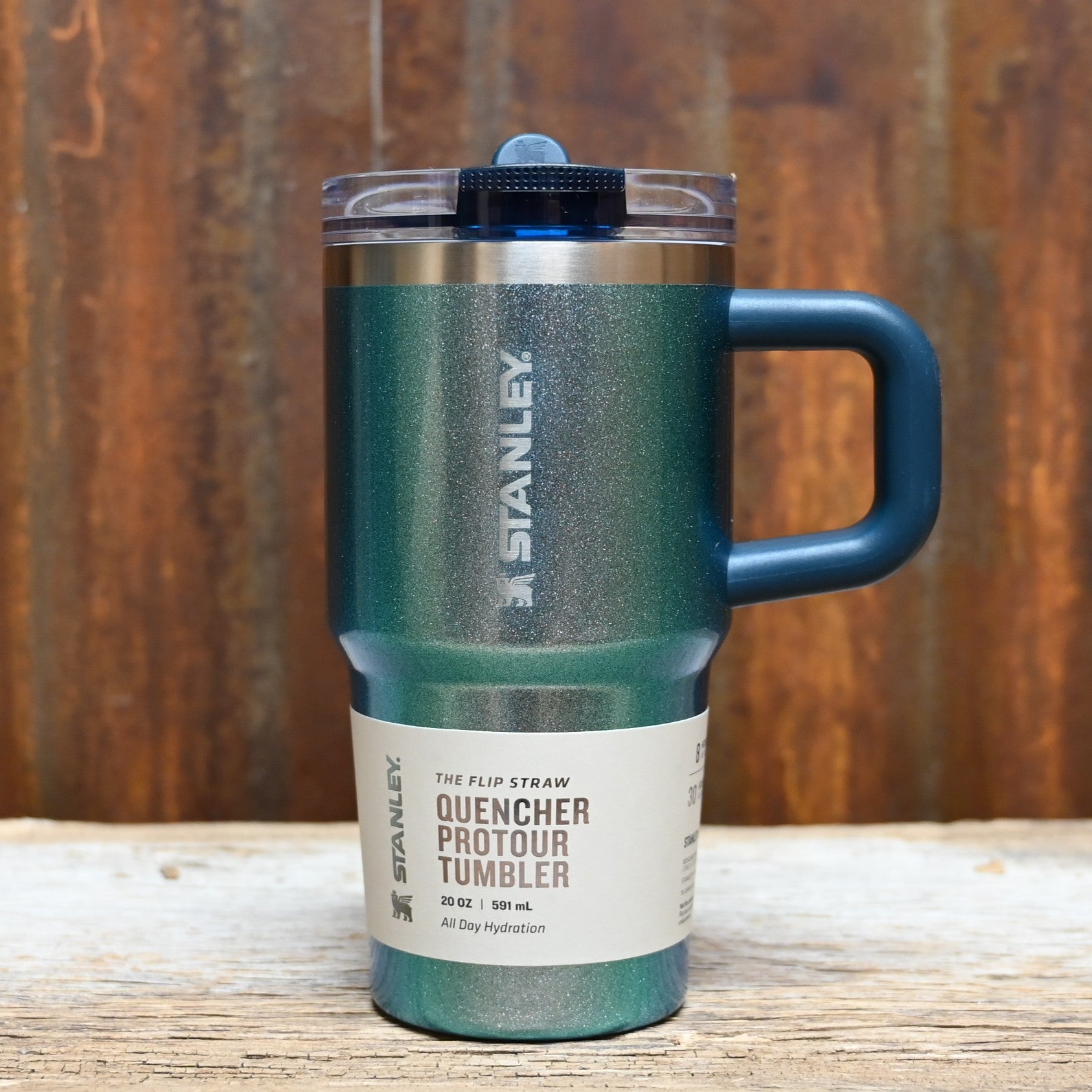 Stanley Quencher ProTour Flip Straw Tumbler 20 oz in Ponderosa Shimmer with flip straw lid and comfort-grip handle