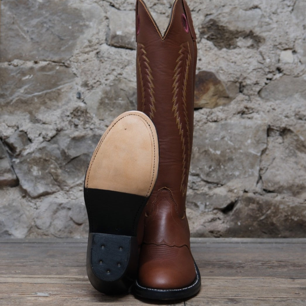 Olathe 18-Inch Cavalry Polo boots in rich brown leather with tall tops.