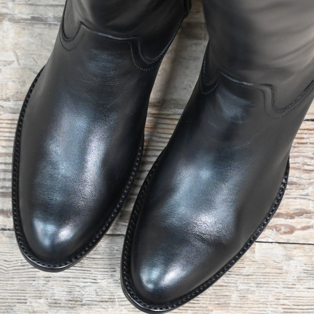 View of Stallion Ladies 16" boots showcasing black French calf vamp and top with B toe and leather stacked heel