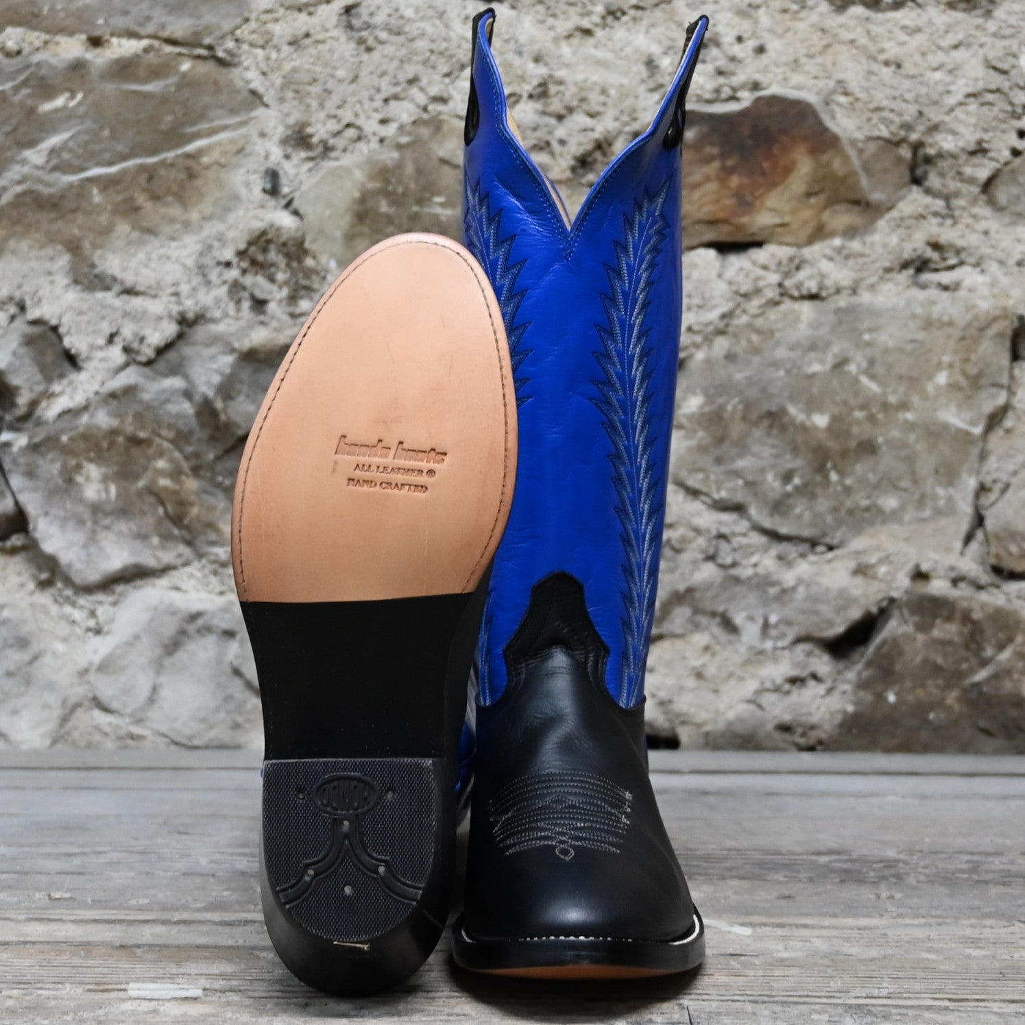 View of Hondo 16" cowboy boot with royal blue top, black retan vamp, pull holes, and medium round toe