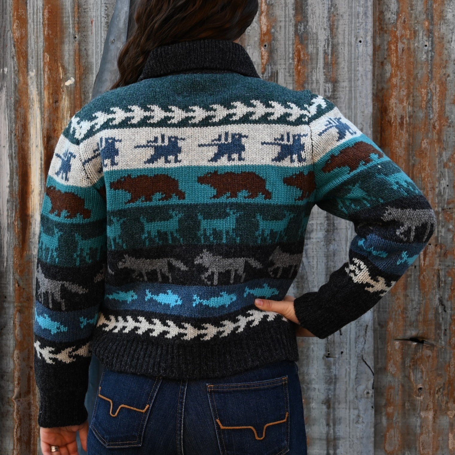View of Filson Ladies Fair Isle Cardigan in Animal Multi featuring wildlife motifs and vertical-entry front pockets