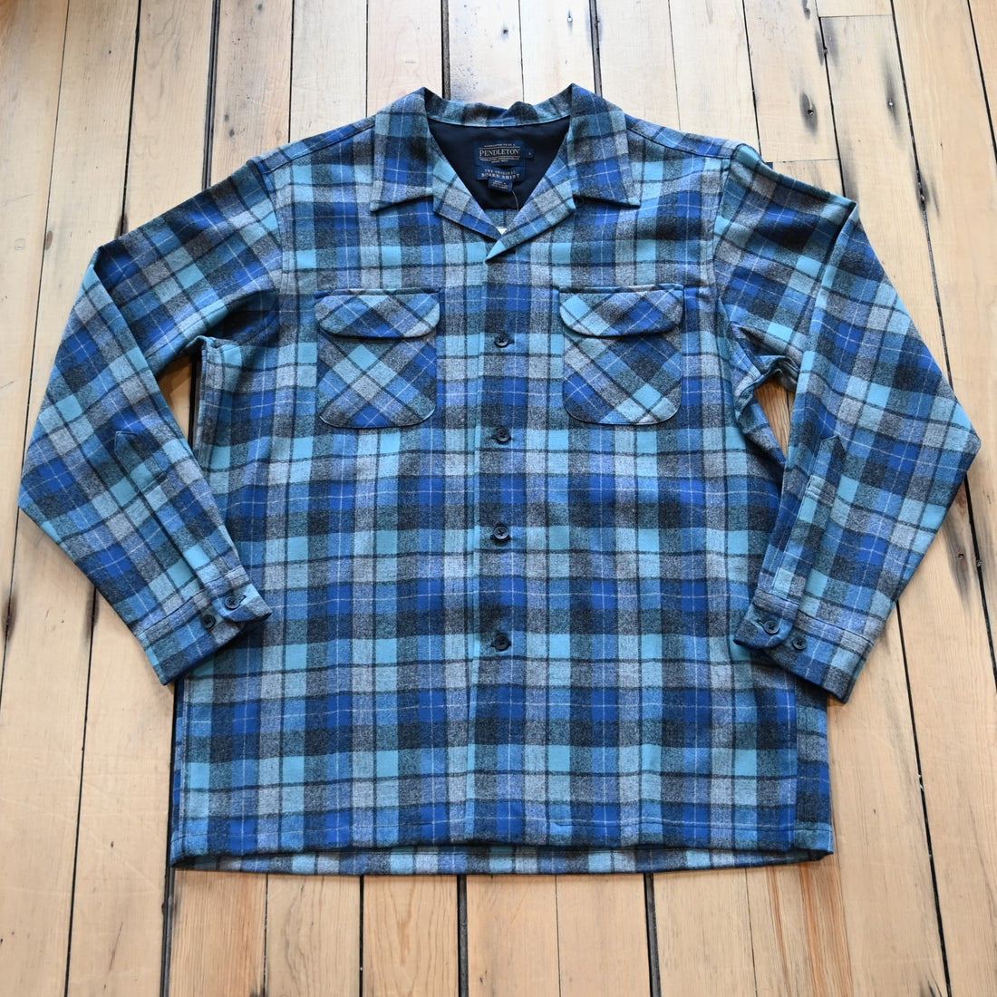 View of Pendleton men’s wool board shirt in Blue Original Soft Plaid with square hem and flap chest pockets