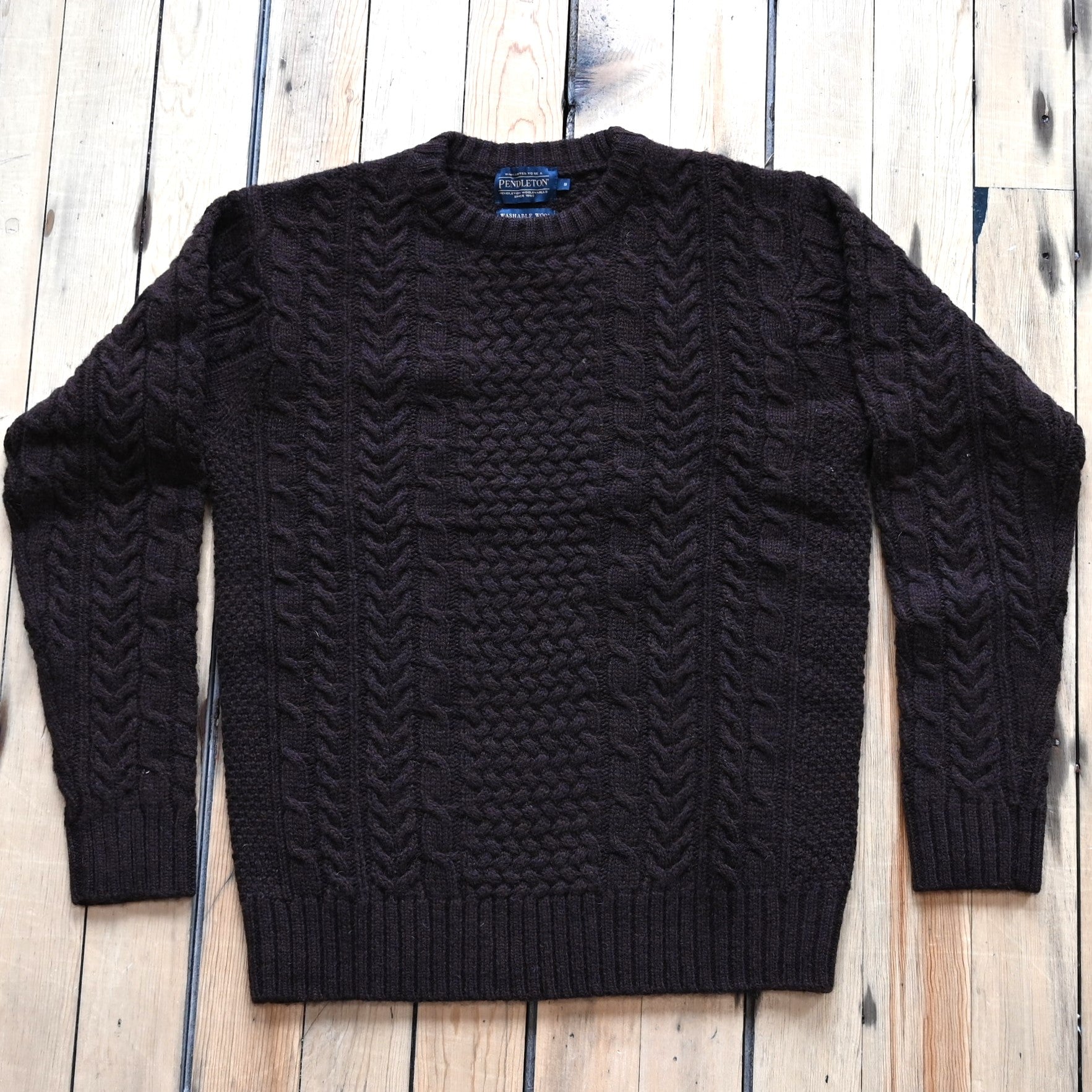 View of Pendleton men’s wool fisherman sweater in Espresso Heather with cable knit texture