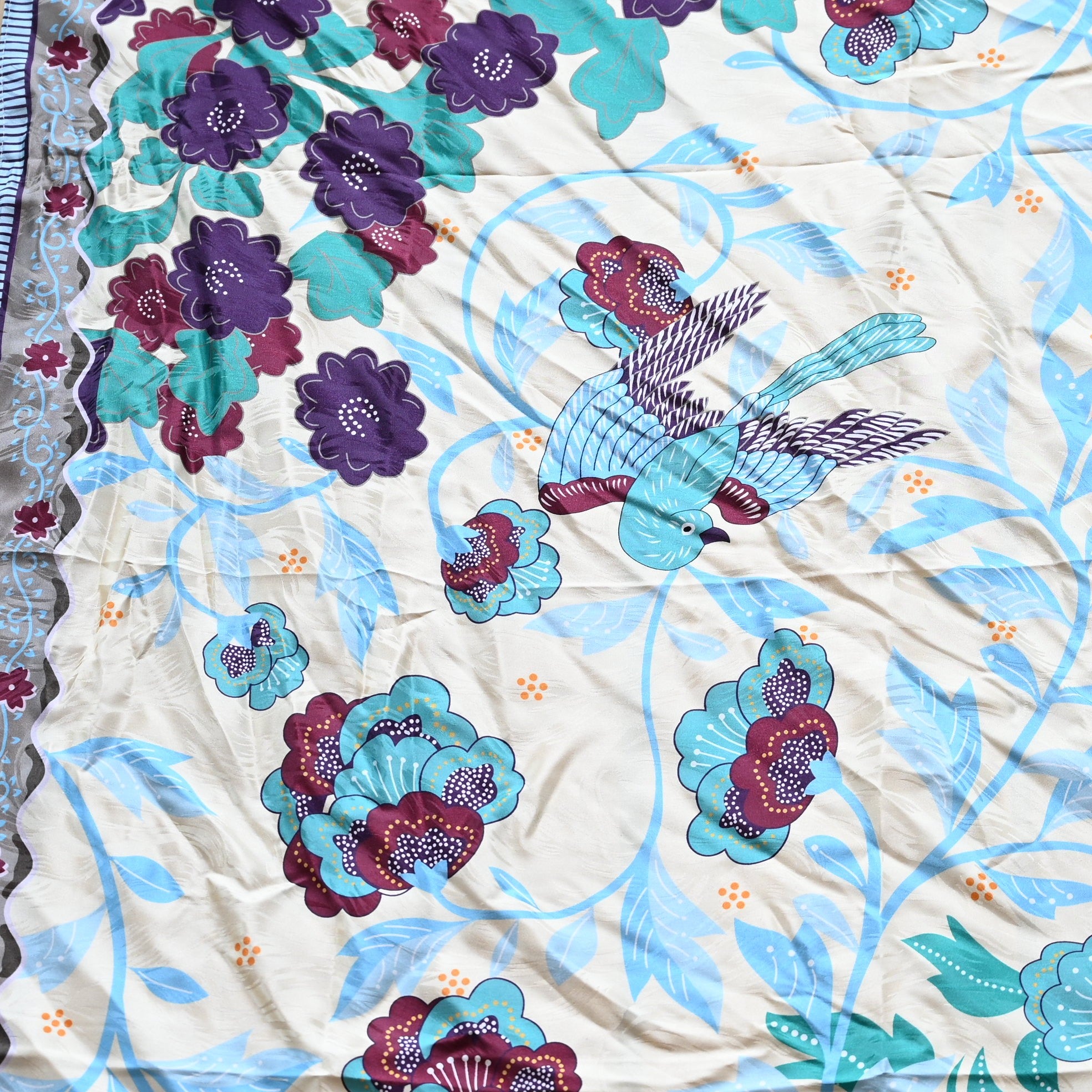 View of Rockmount silk scarf with Buffalo Bill floral and swallow design – 36" square