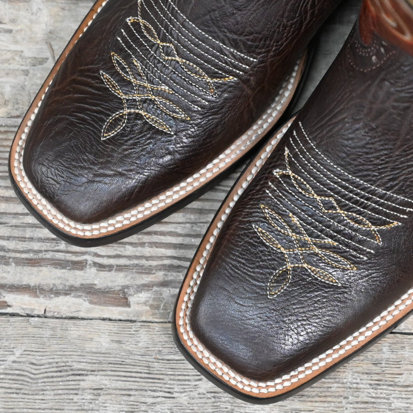 View of Hondo 13" cowboy boot with rust volcano top, chocolate shoulder vamp, and medium square toe