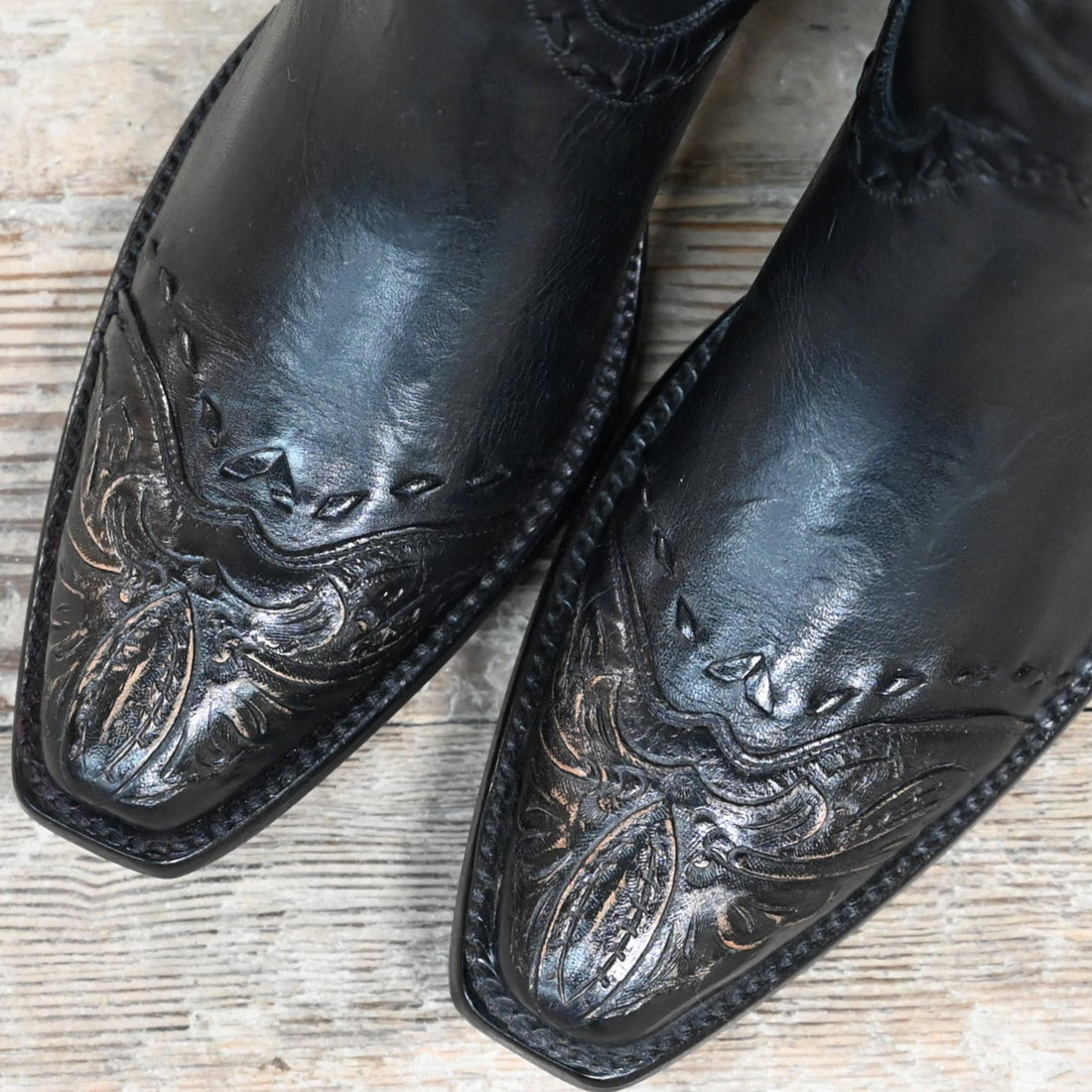 View of Stallion Ladies 10" Black Ranch Hand Boot with tooled top, whipstitch, and buck lacing