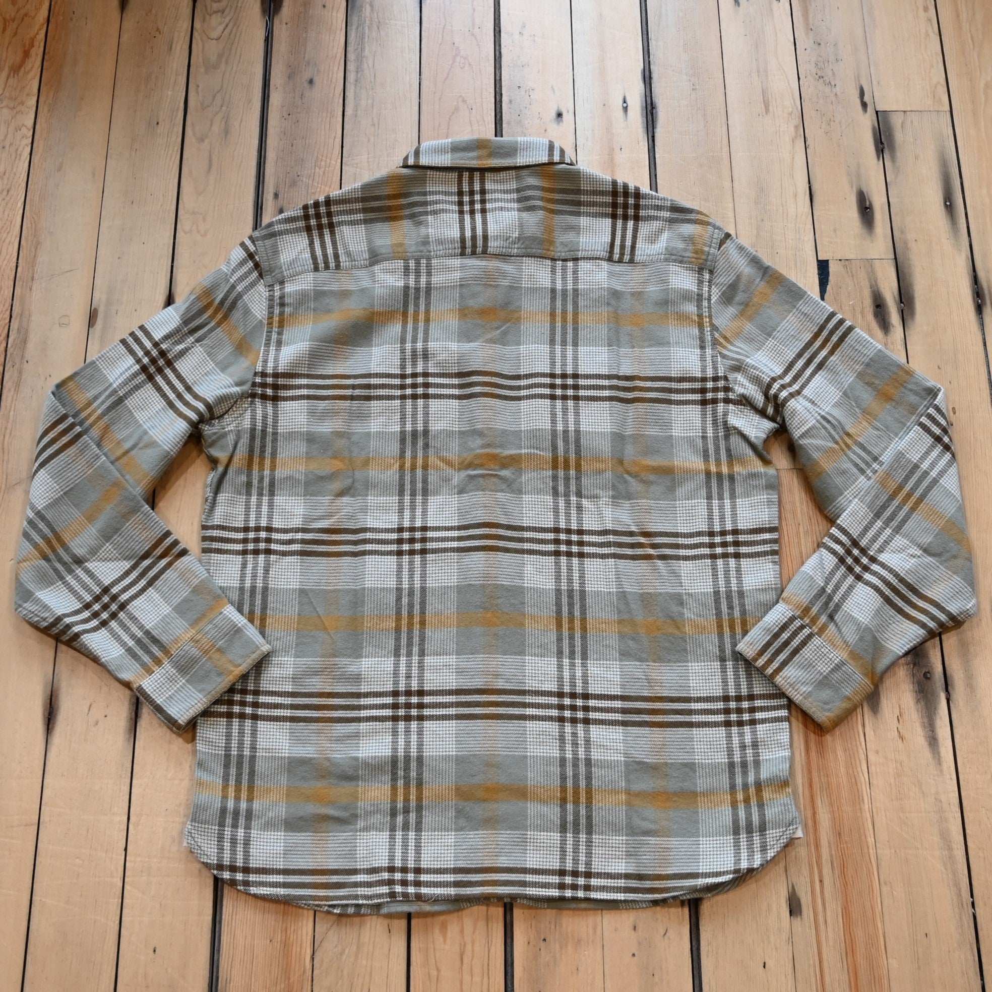 View of Plaid button-up shirt in tan, brown and grey by Pendleton Burnside style