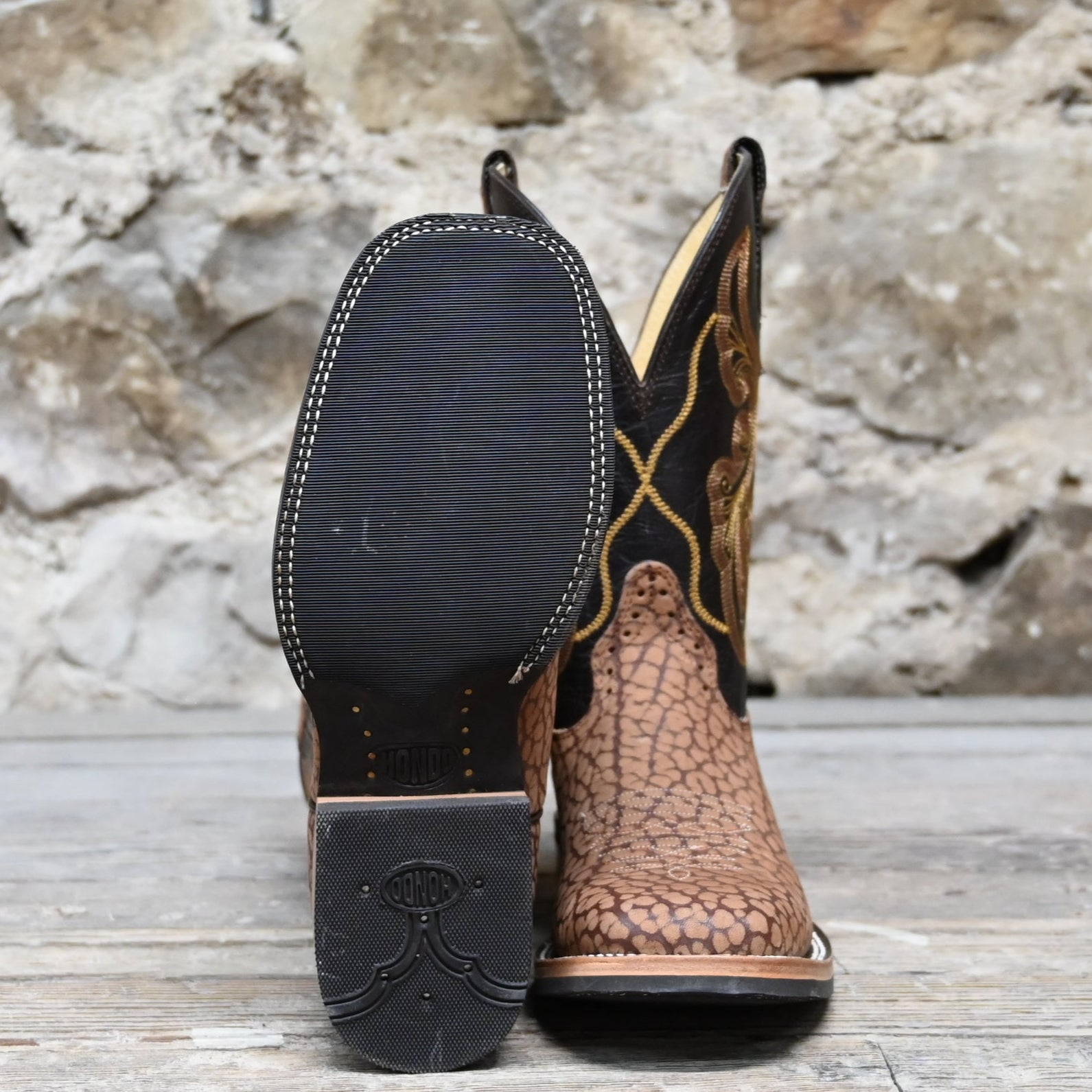 View of Hondo 11" cowboy boot with sand nubuck bullhide vamp, brown volcano top, and wide square toe