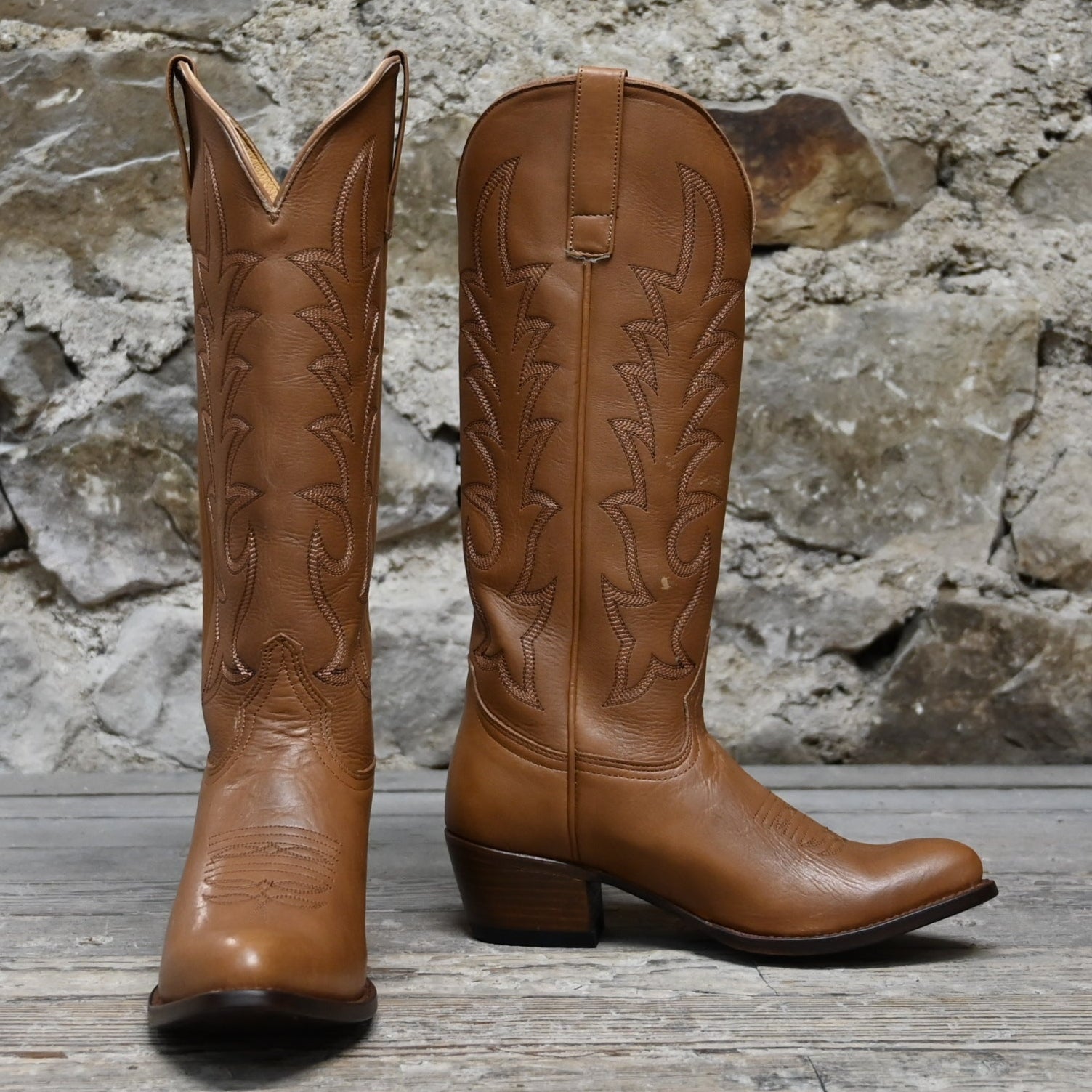 View of Macie Bean 15″ “Elle On Wheels” boot in tan Telluride leather with almond toe and City Girl heel