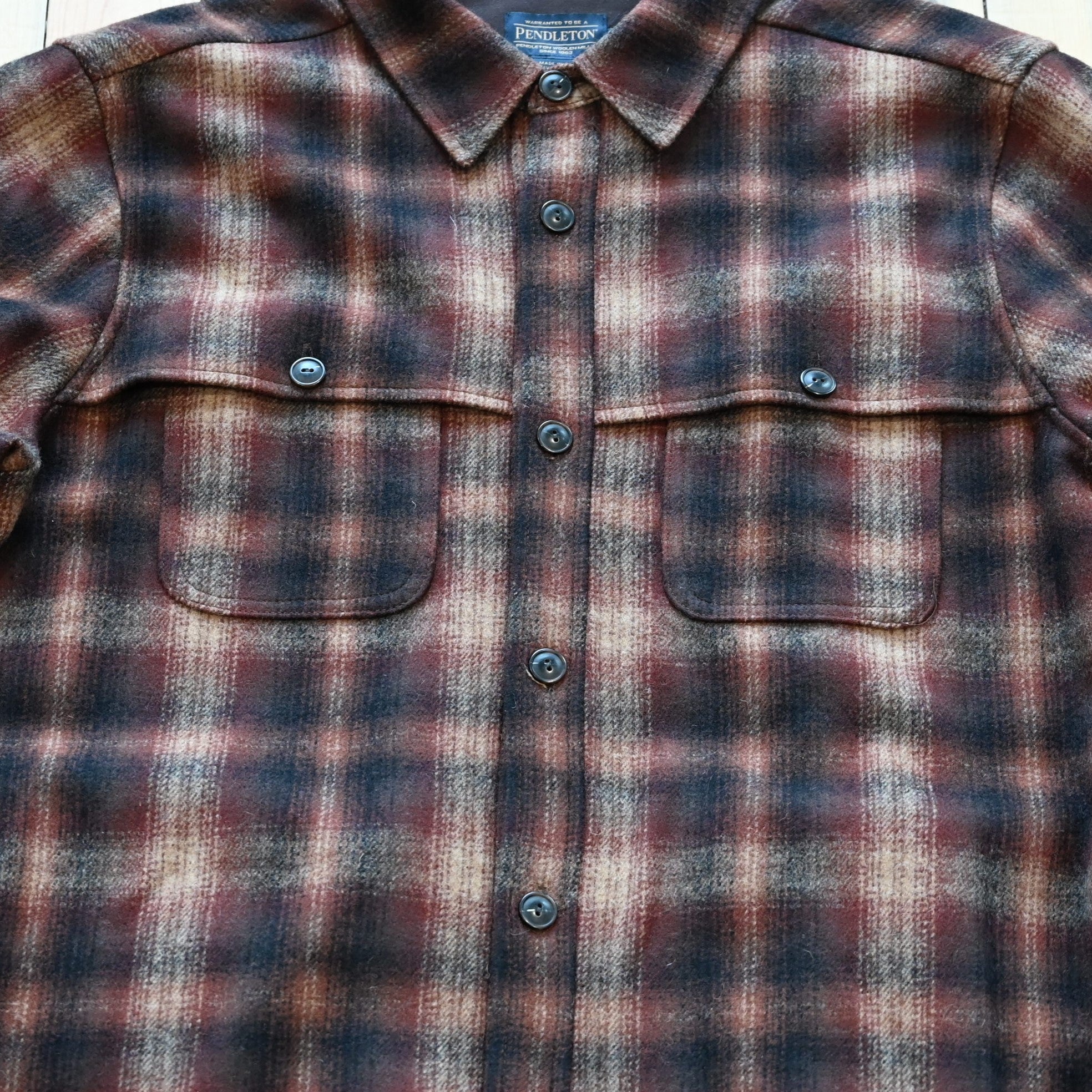 View of Pendleton men’s Heston wool coat in brown and rust ombré with chest and side pockets