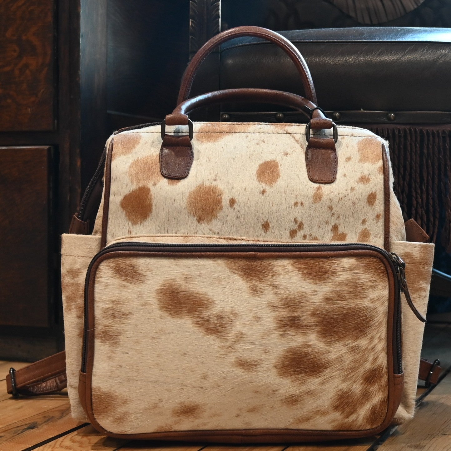 American Darling genuine hair-on leather backpack in light brown cowhide hide with Western-inspired design