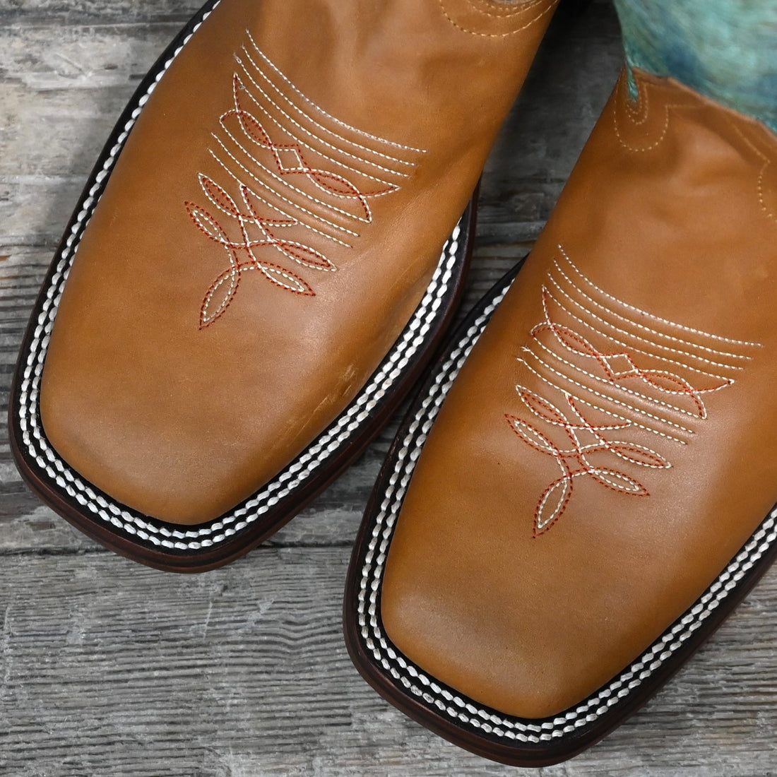 View of Hondo 16" cowboy boot with turquoise crater top, honey crazy horse vamp, wide square toe, and pull holes