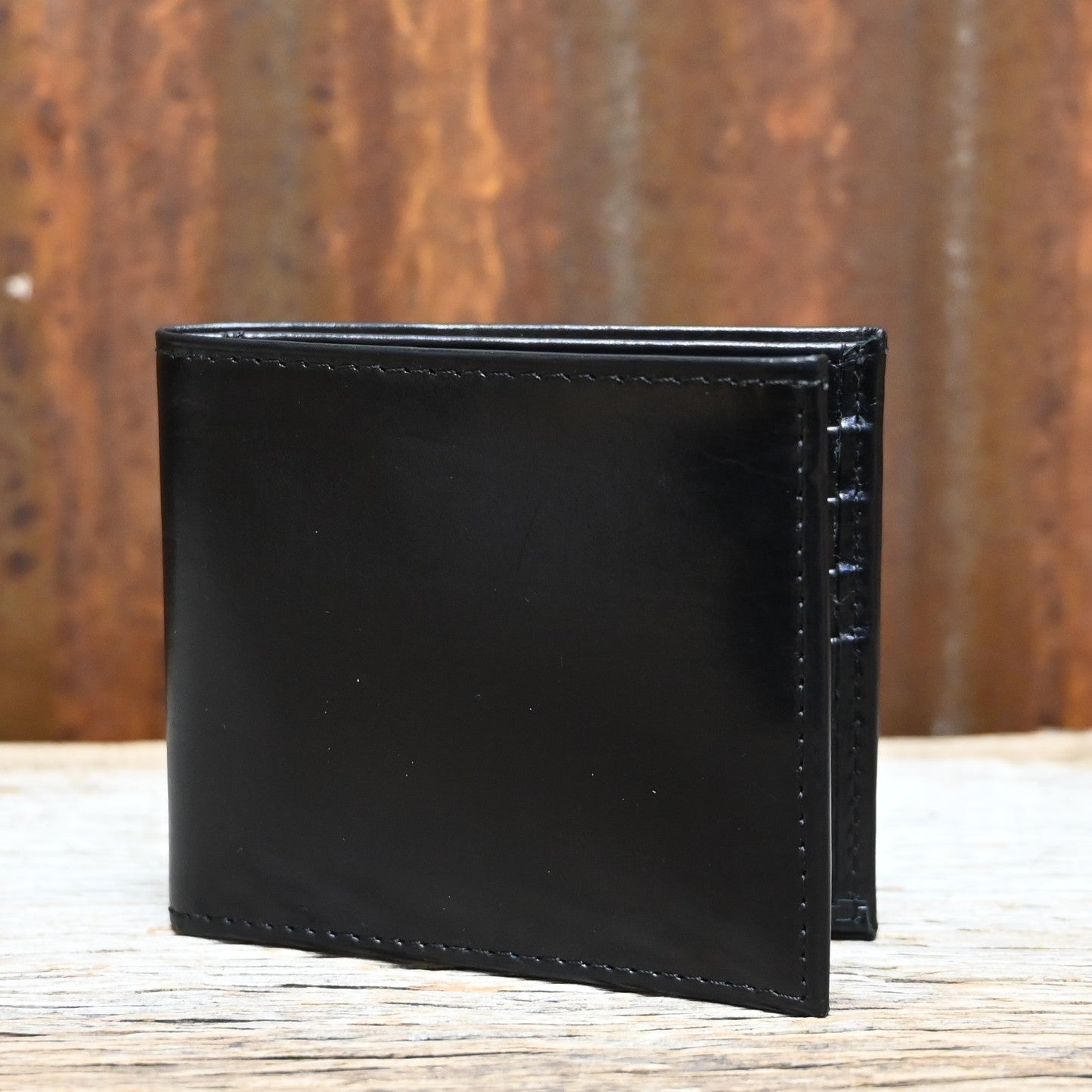 Lucchese black slim leather hipster wallet with card slots and embossed logo