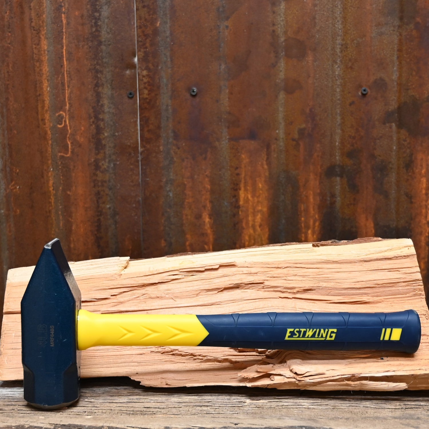 Estwing 64 oz blacksmith’s hammer with forged steel head and fiberglass handle