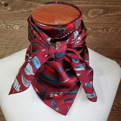 Cowboy Images feathers on maroon wild rag 36x36