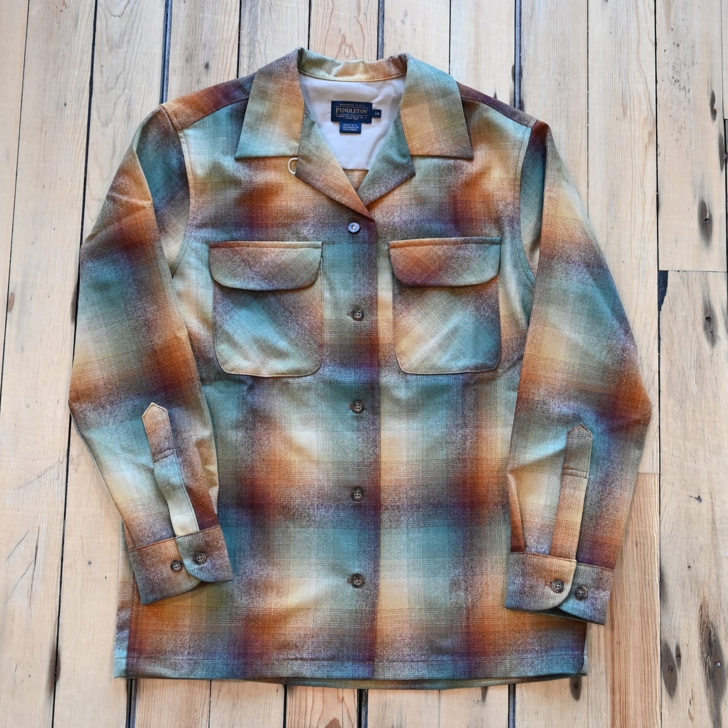 View of Pendleton boyfriend board shirt in gold‑to‑green ombre virgin wool with chest pockets