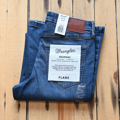 View of Wrangler Ladies flare jeans in Lily wash with high-rise waist and slim fit from the Bespoke Collection