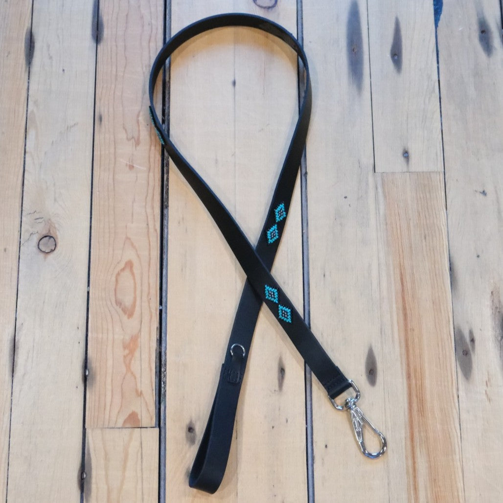 Saint Barth Sambboho hand-beaded dog leash in black leather with blue and silver glass beads.