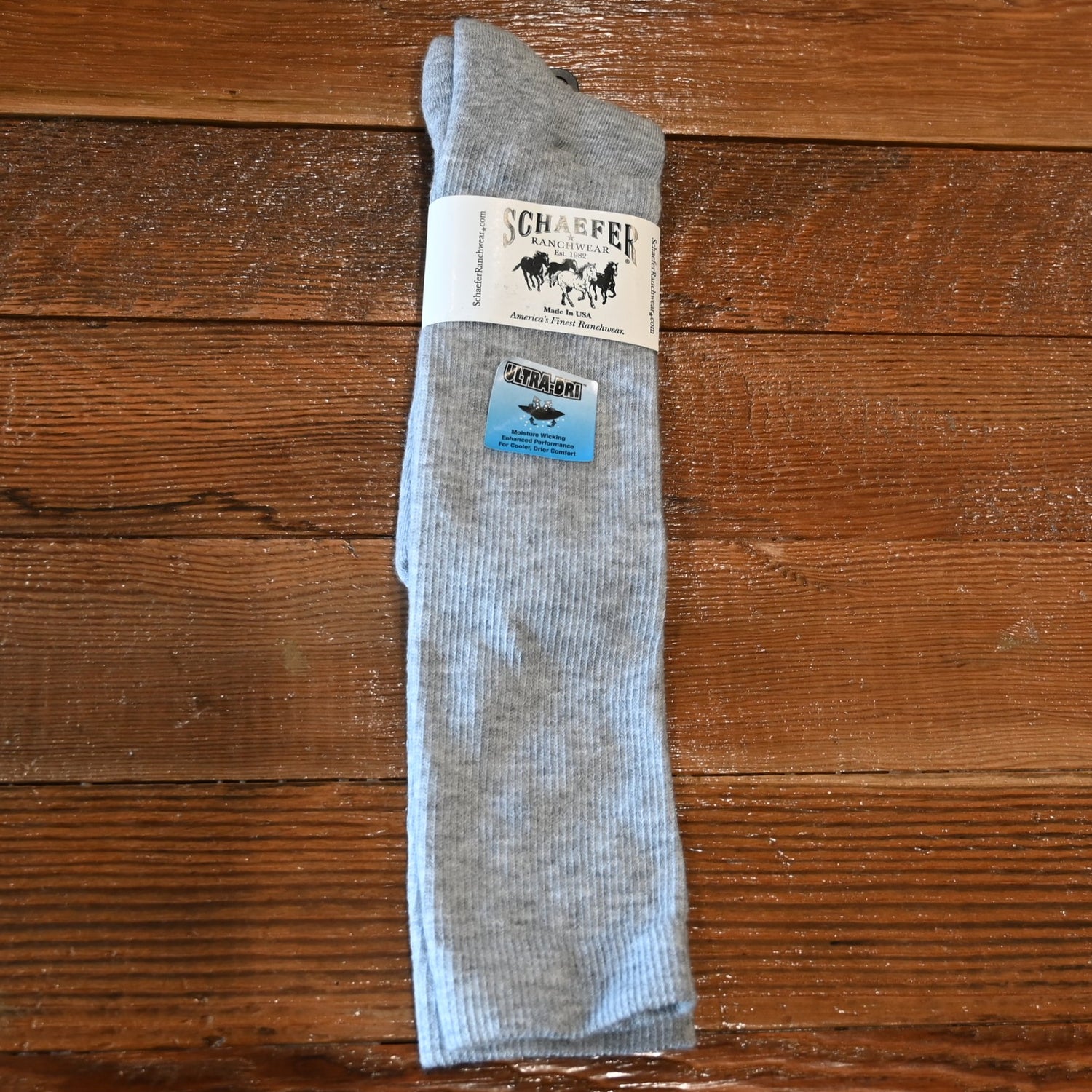 View of Grey over-the-calf Schaefer Mesa Wick boot sock with cushioned leg and flat toe seam