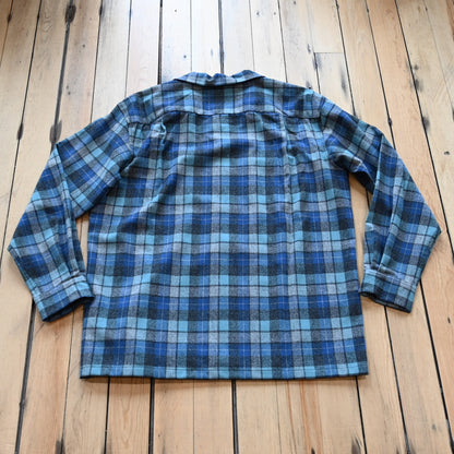 View of Pendleton men’s wool board shirt in Blue Original Soft Plaid with square hem and flap chest pockets