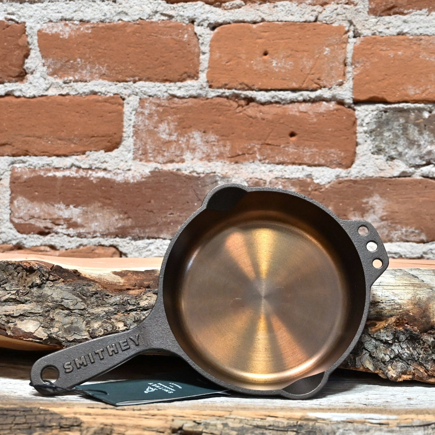 View of Smithey Ironware No. 6 Cast Iron Skillet with polished interior and ergonomic handle