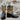 View of Hyer NANETTE 9" boots showcasing black cowhide vamp and sunflower vintage goat top with butterfly inlay, fashion snip toe, and leather stacked heel