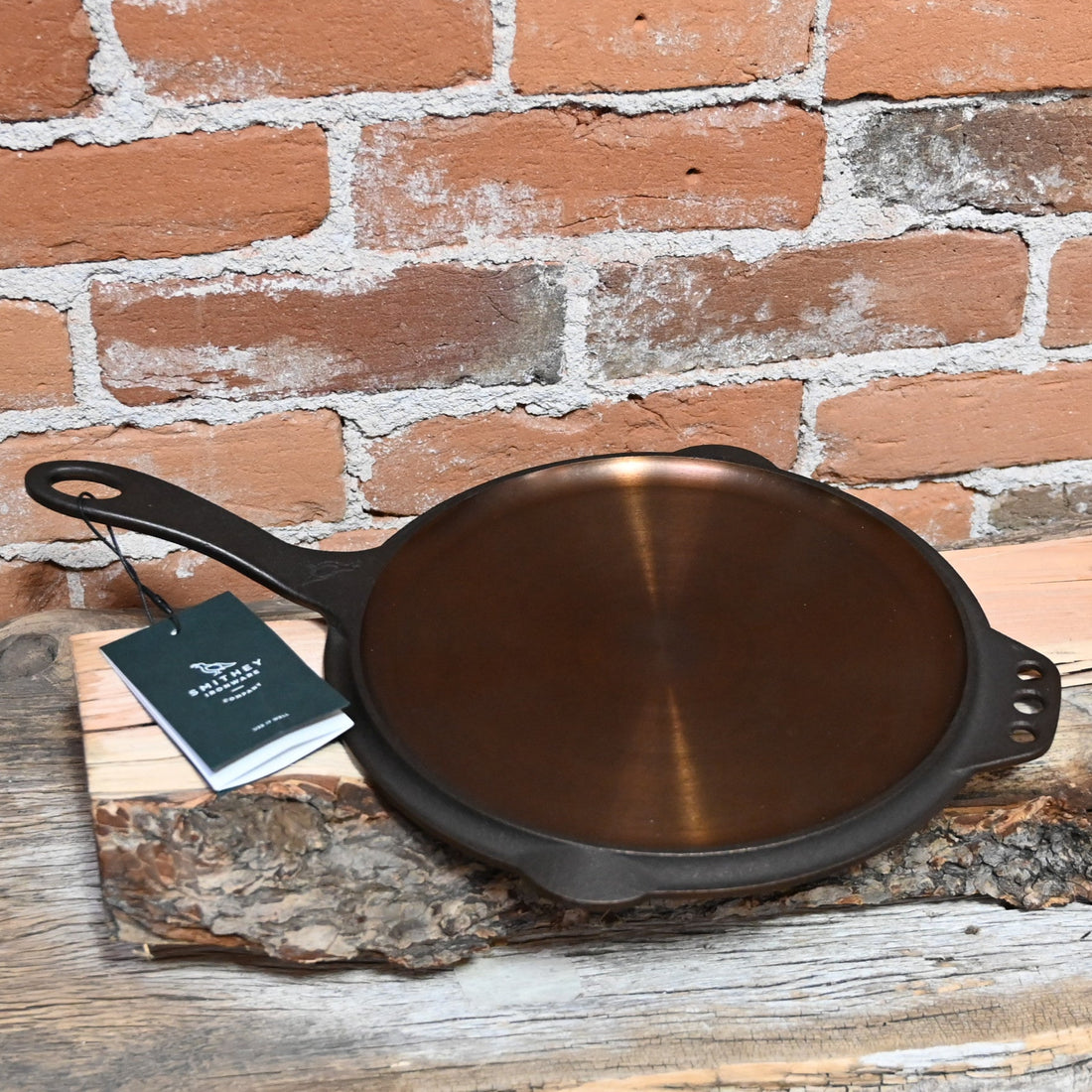 View of Smithey No. 10 Flat Top Griddle – Hand-forged cast iron griddle with polished, pre-seasoned surface and extended handle
