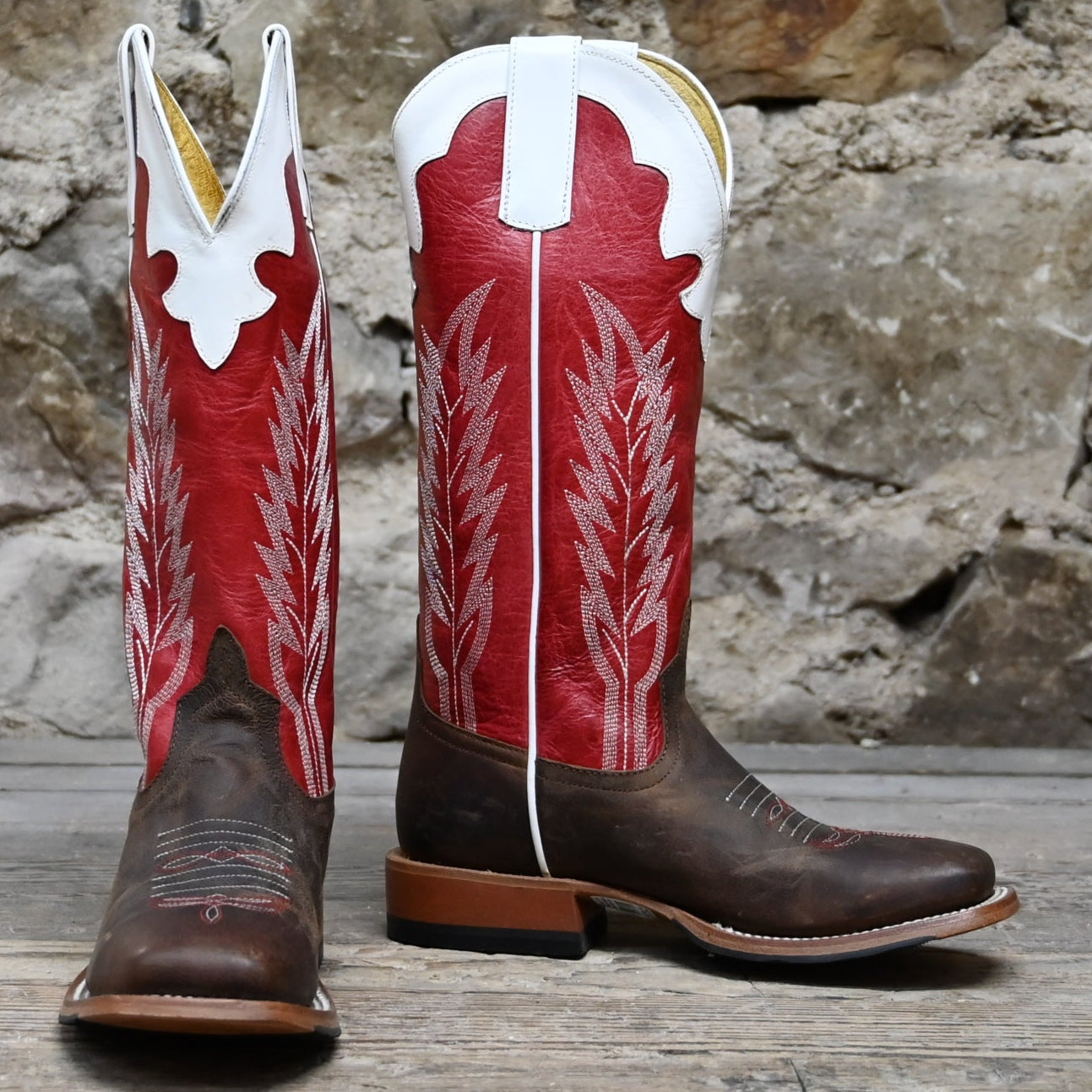 View of Anderson Bean kids boot with red top, saddle mad dog vamp, and pull straps