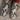 View of Macie Bean 13″ boot with red Station shaft, mink python vamp, and cutter toe