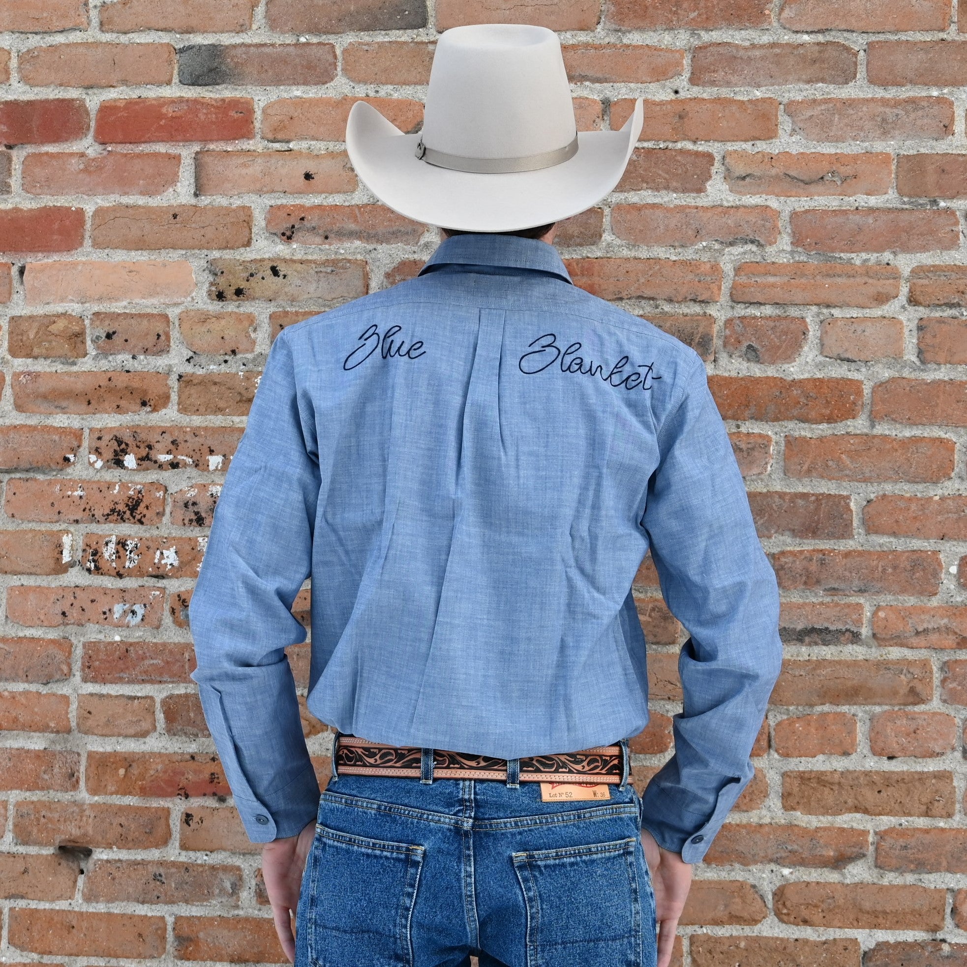 View of Blue Blanket men’s light denim Western shirt with embroidered back and chest pockets