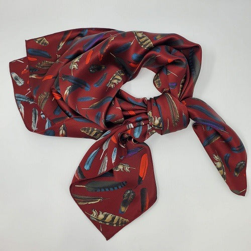 Cowboy Images feathers on maroon wild rag 36x36