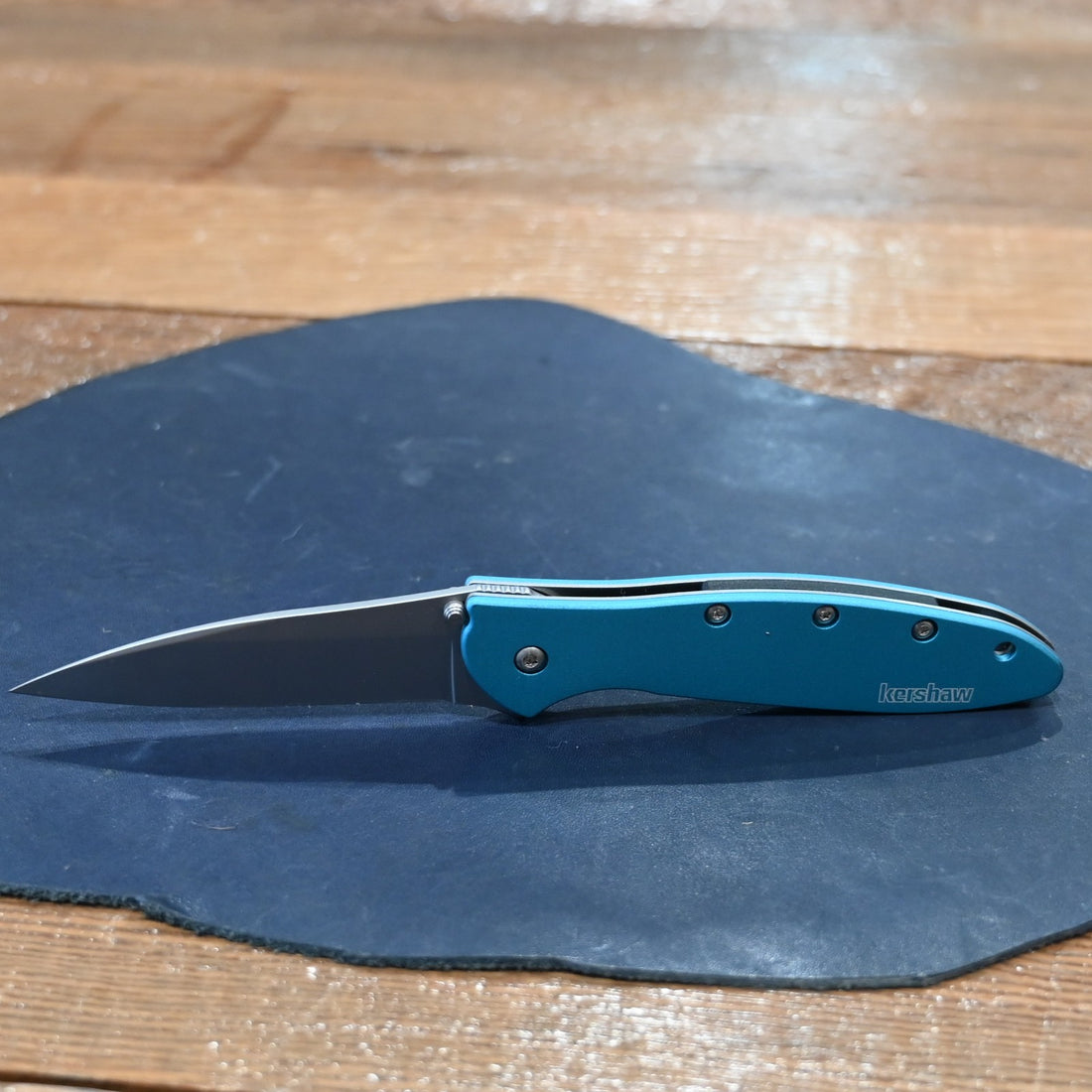 Kershaw Leek folding knife with teal aluminum handle and stainless steel blade