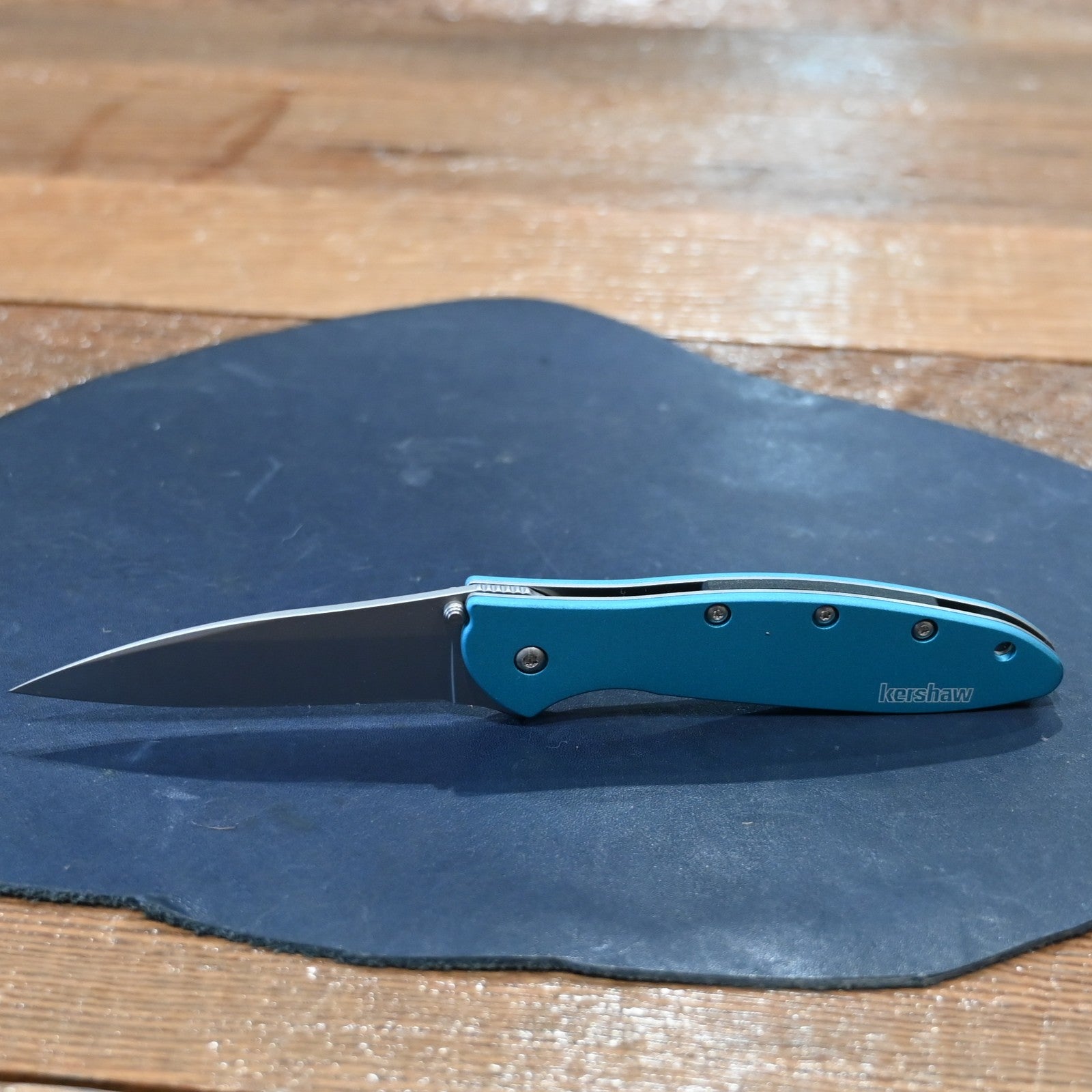 Kershaw Leek folding knife with teal aluminum handle and stainless steel blade