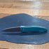 Kershaw Leek folding knife with teal aluminum handle and stainless steel blade