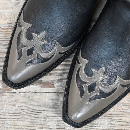 View of Stallion Ladies 11&quot; midnight hair-on boot with gray wingtip, foxing, and multicolor inlays