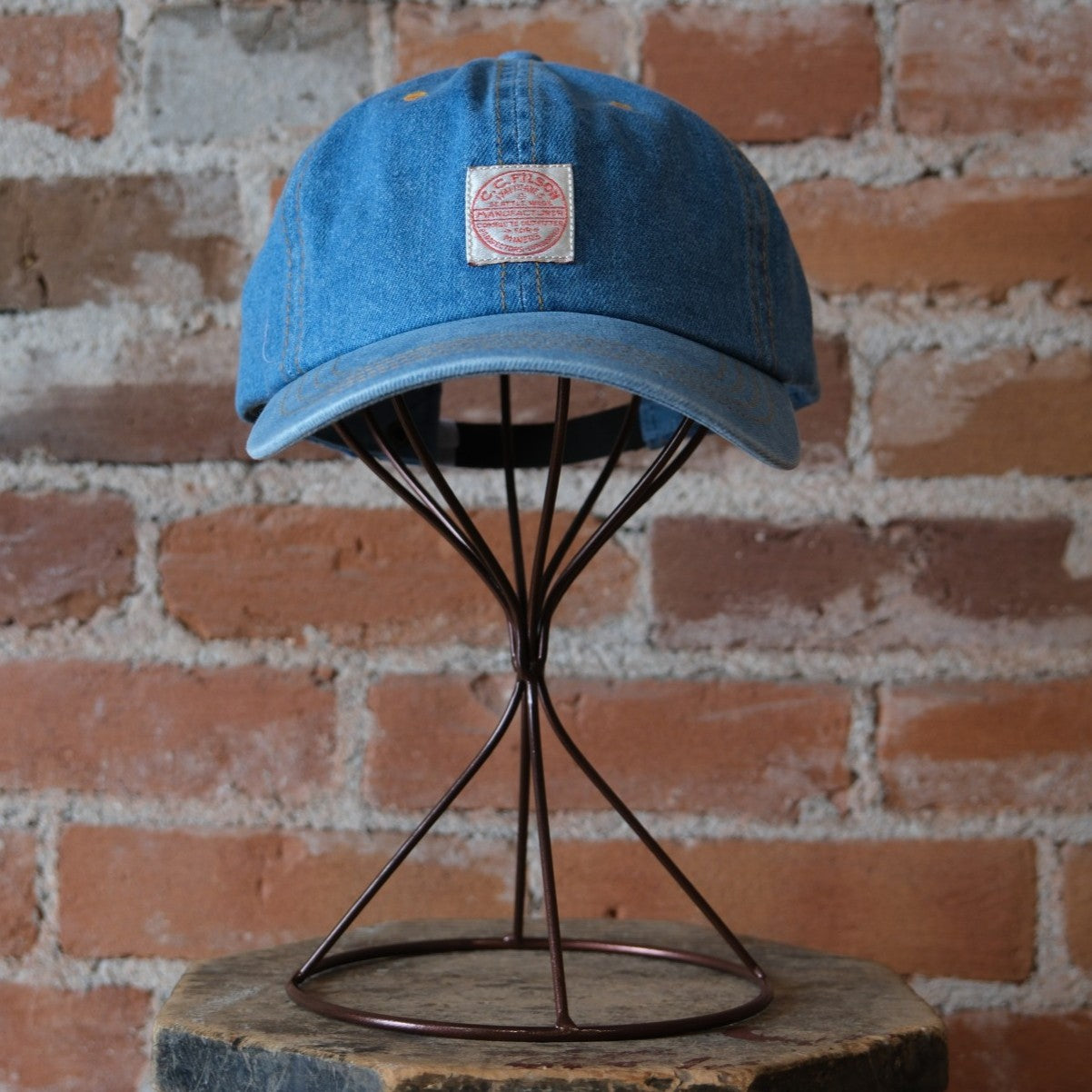 Filson 9.5-oz. Denim Cap in Medium Indigo featuring a 6-panel design and vintage Filson logo patch.