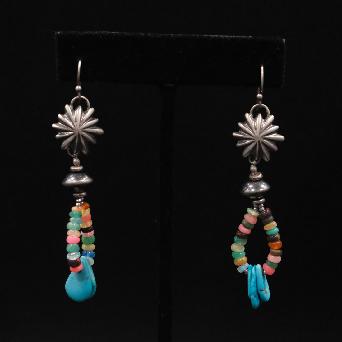 Peyote Bird Revival mixed stone and turquoise dangle earrings displayed on black background