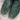 View of Horse Power 11" High Noon boot with emerald suede vamp, tan and black bison top, cutter toe, rainbow stitching, and pull straps