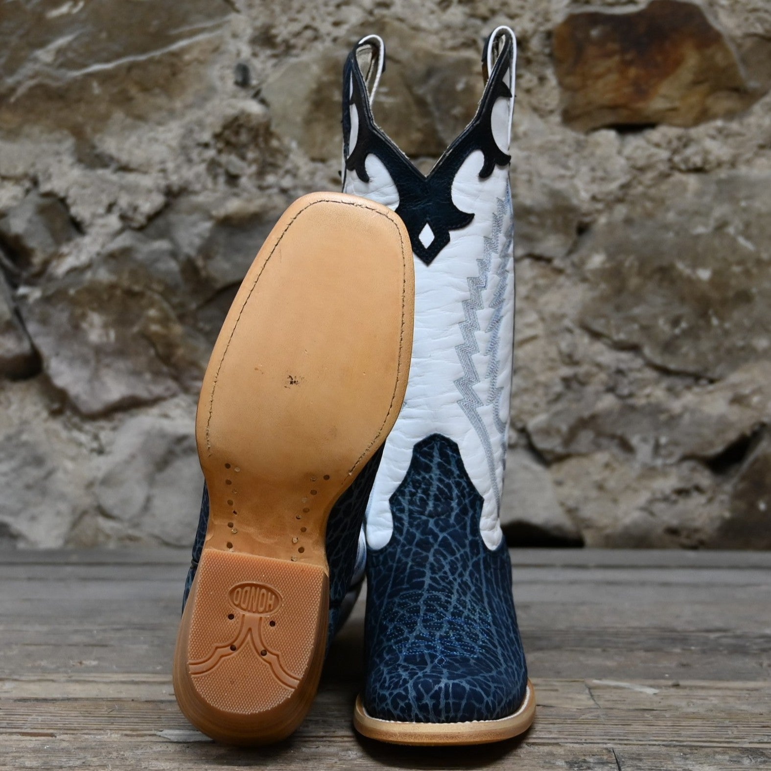 View of Hondo 13&quot; cowboy boot with white top, navy nubuck bullhide vamp, blue stitching, snip toe, and spur ledge