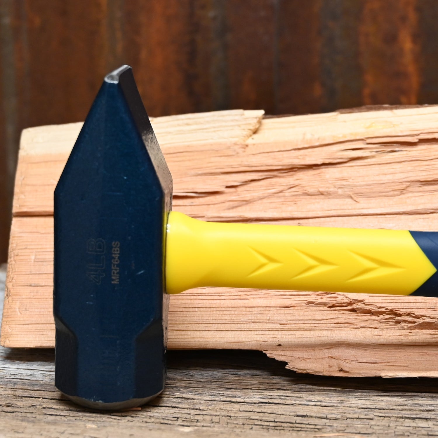 Estwing 64 oz blacksmith’s hammer with forged steel head and fiberglass handle