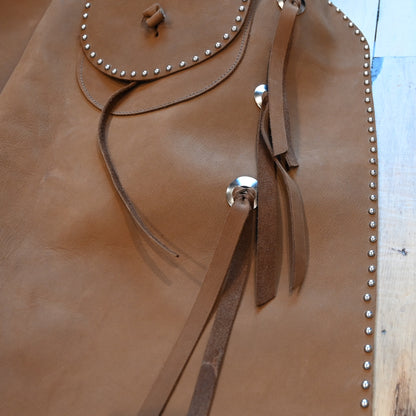 View of K Bar J Batwing Chap in size Medium with rivets and a pocket