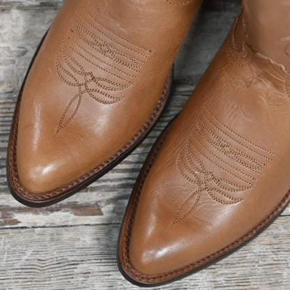 View of Macie Bean 15″ “Elle On Wheels” boot in tan Telluride leather with almond toe and City Girl heel