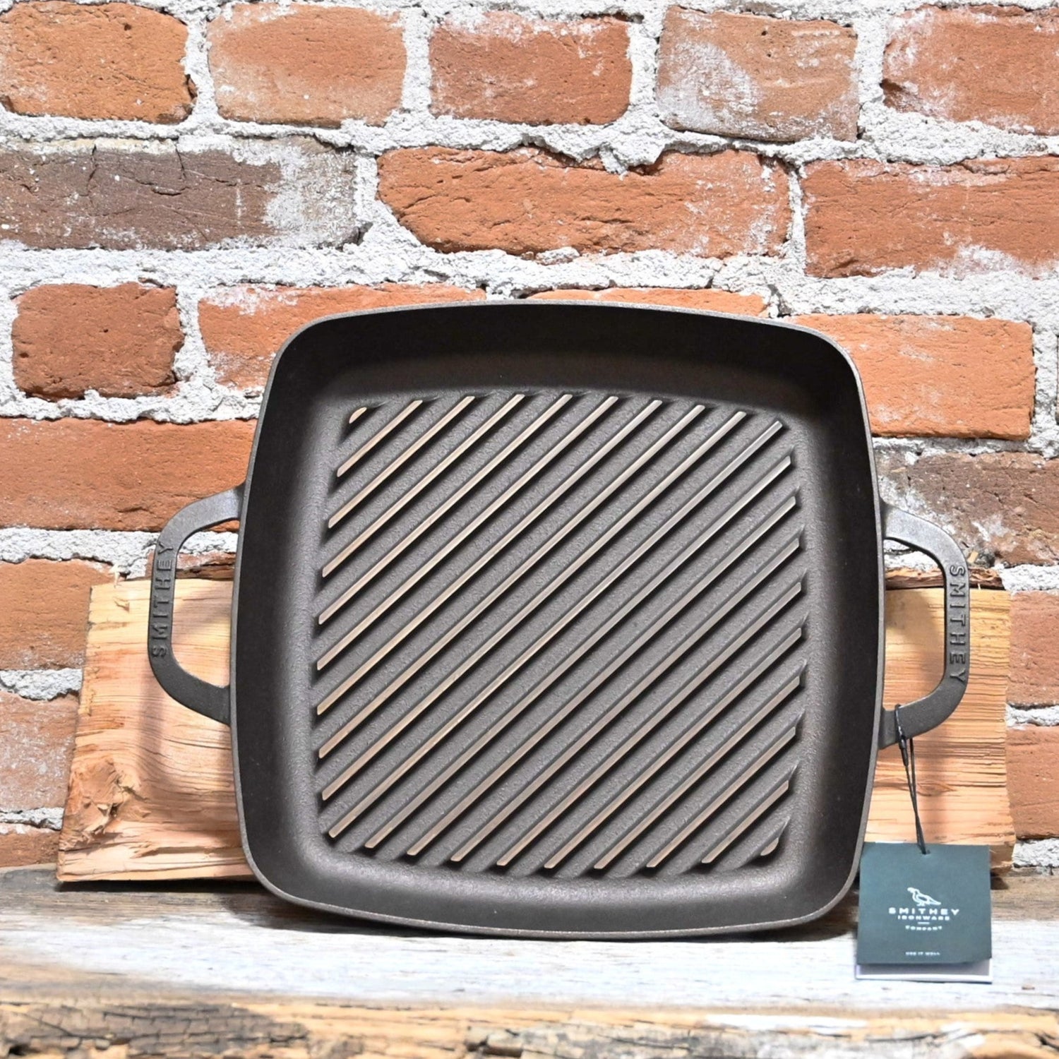 View of Smithey Ironware No. 12 Cast Iron Grill Pan with polished ridges and dual handles