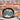 View of Smithey Ironware No. 12 Cast Iron Skillet with polished surface and ergonomic handle