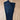 View of Kimes Ranch Chloe Jeans in Blue, featuring a mid-rise waist, fitted thigh, and flare bootcut leg with hand-sanded details