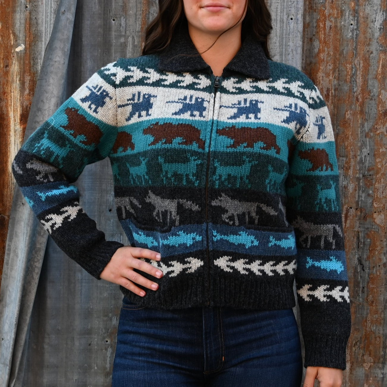 View of Filson Ladies Fair Isle Cardigan in Animal Multi featuring wildlife motifs and vertical-entry front pockets