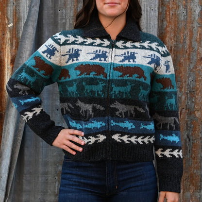 View of Filson Ladies Fair Isle Cardigan in Animal Multi featuring wildlife motifs and vertical-entry front pockets